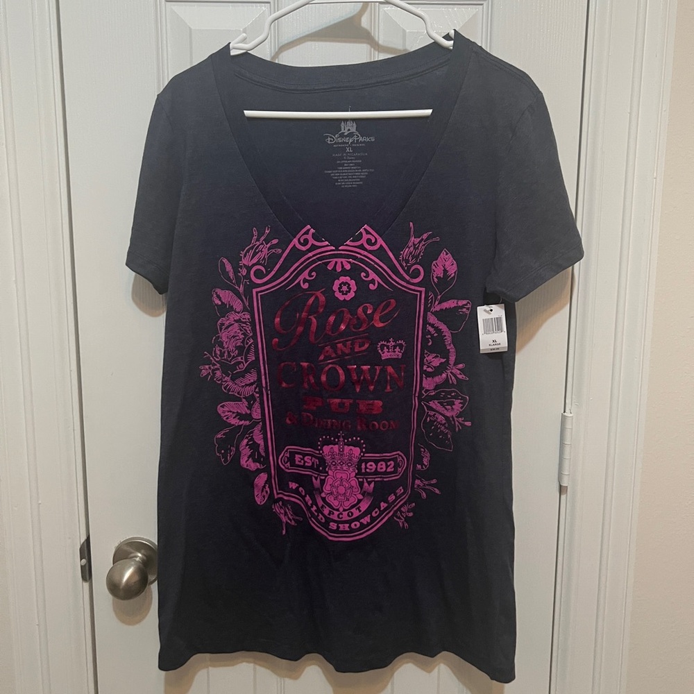 Disney Women's Rose and Crown Pub Dark Blue Gray and Pink Graphic V-Neck Tee